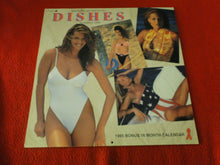 Load image into Gallery viewer, Vintage Semi-Nude Pinup Wall Calendar 1995 Supermodels Dishes 12 x 12          G
